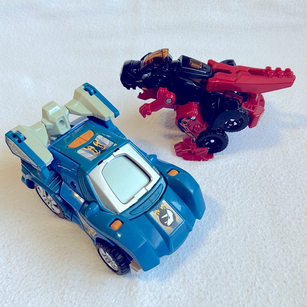 Switch and Go Dinos - Horns the Triceratops & T-Rex Muscle Car VTech Dinosaurs